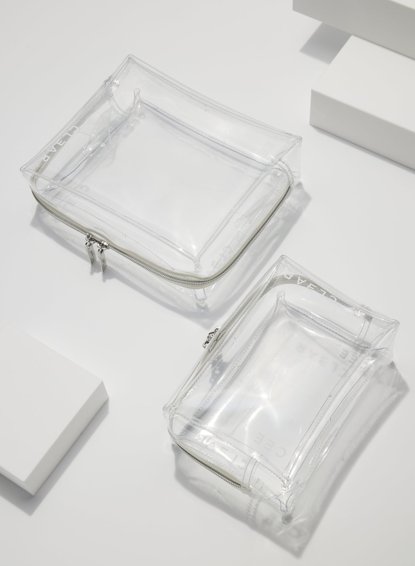 CLEAR LARGE + SMALL COSMETIC CASE SET